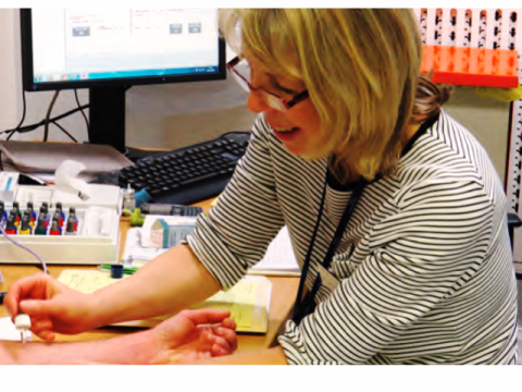 Image of Julie Cannon performing skin prick testing - Julie is profiled in Royal Brompton Hospital magazine 'In Touch'