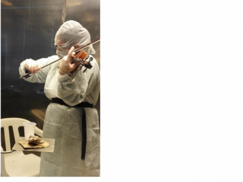 Image in violinist in protective clothing, provided to us by Hille Suojalehto, Adjunct Professor at the Finnish Institute of Occupational Health, Helsinki - two winners of the Society of Occupational Medicine's photo competition